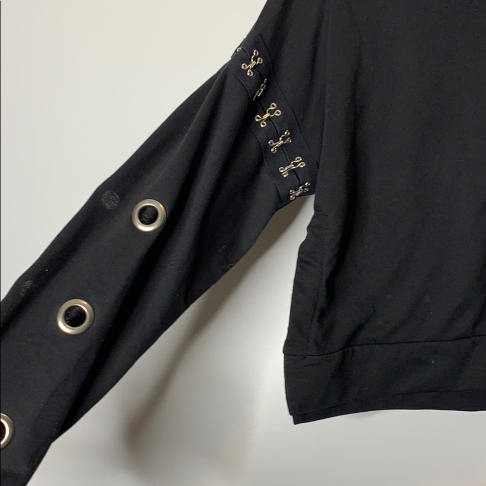 BLACK DISTRESSED SWEATER WITH METAL DETAILS